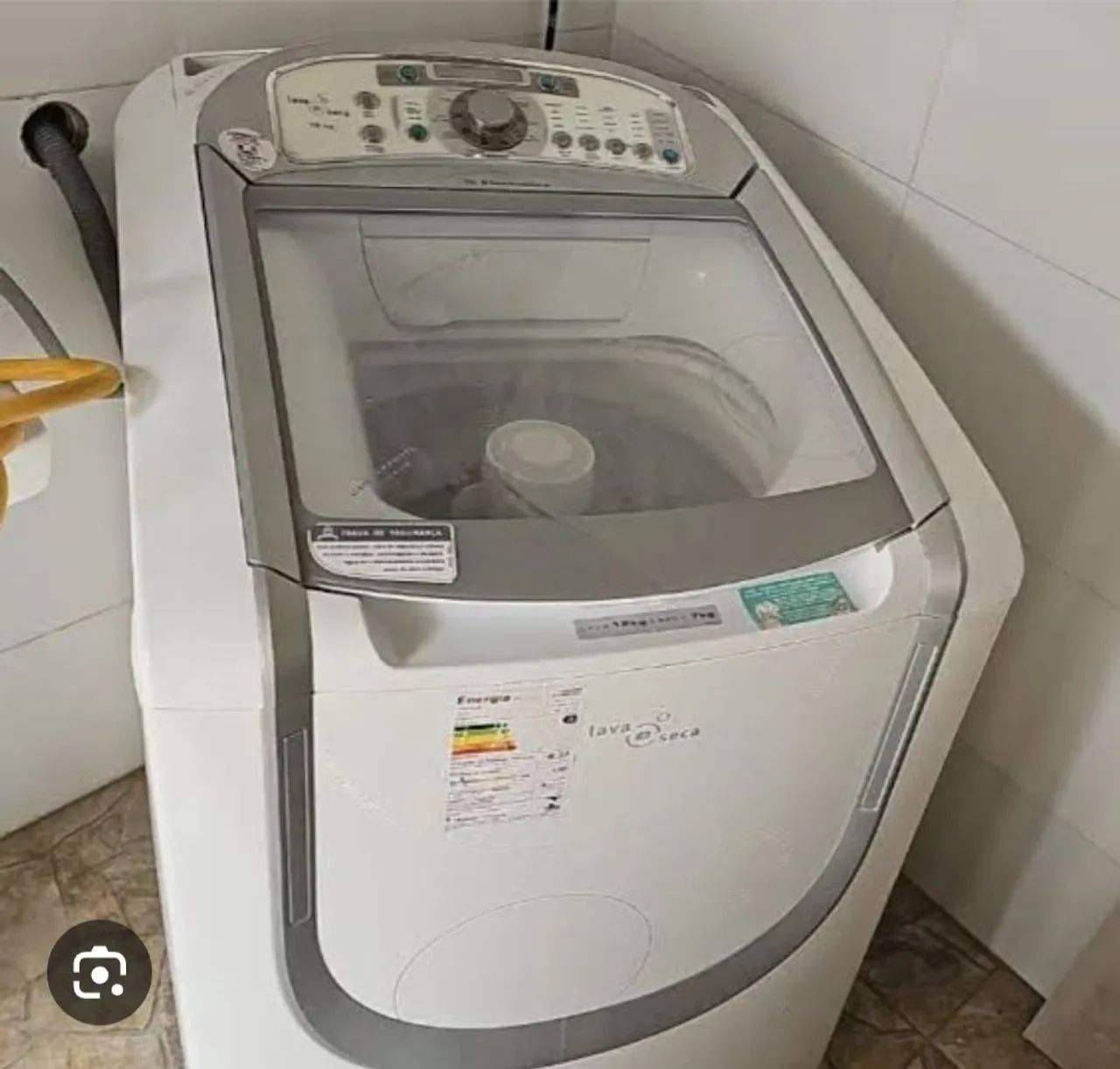 Máquina de lavar com defeito 