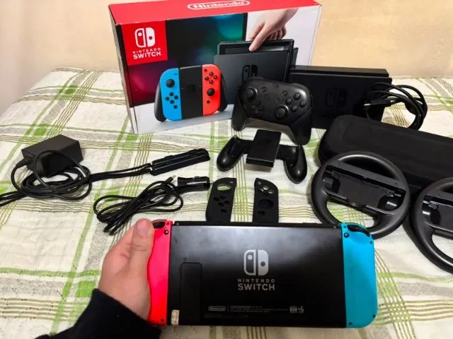 Nintendo Switch Completo na Caixa + Pro Controller + Diversos Acessórios - Foto 3