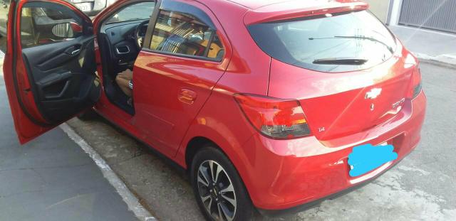 Onix vermelho ferrári - Foto 2