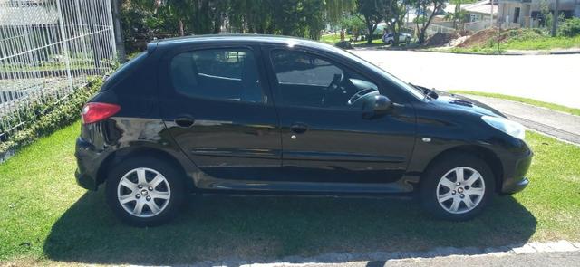 Peugeot 207 1.4 ano 2011 completo - Foto 4