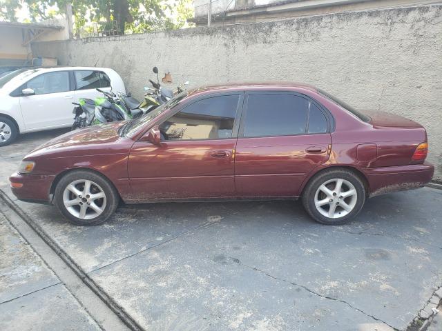 Corolla 94 le 1.8 mec vinho(lindo!)completo+rodas+revisado+novo!!! - Foto 5