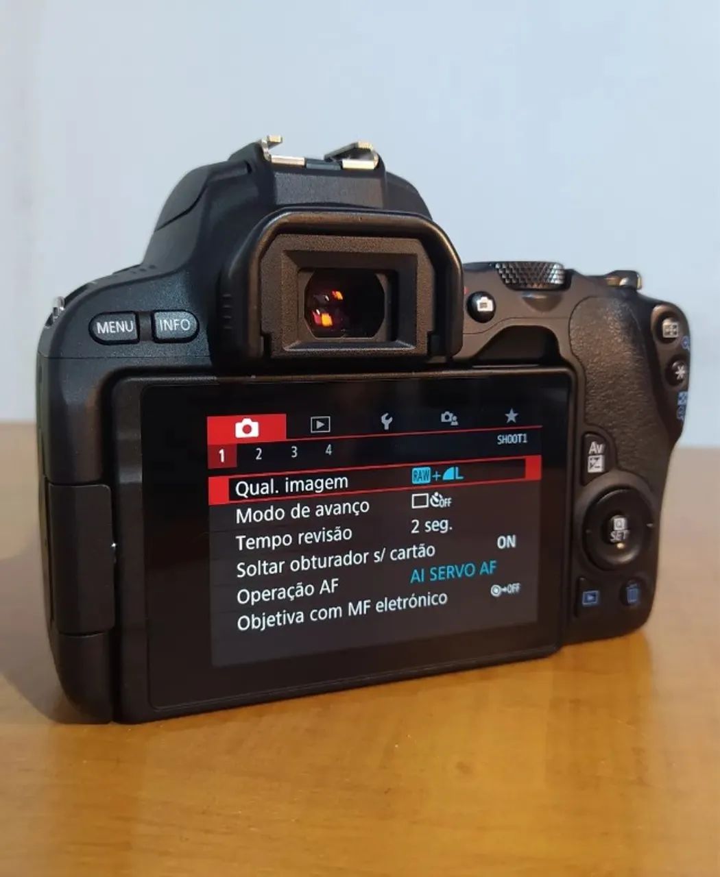 Camera canon SL2 + lente 18-55mm semi nova