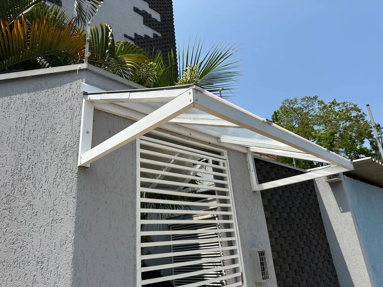 Toldo em policarbonato porta  - Foto 2