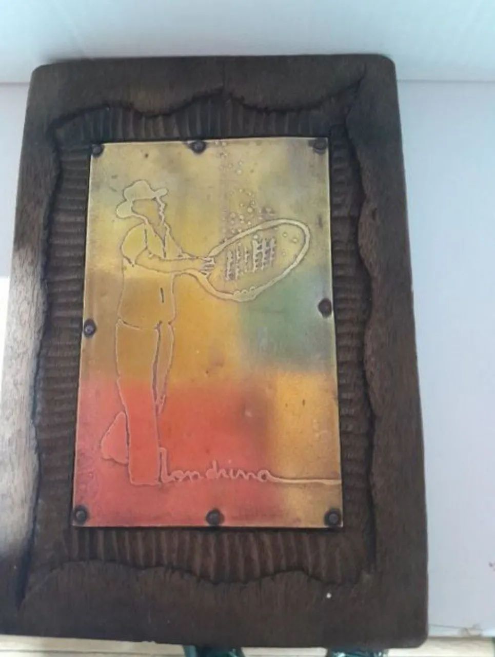 quadro entalhado em madeira e bronze