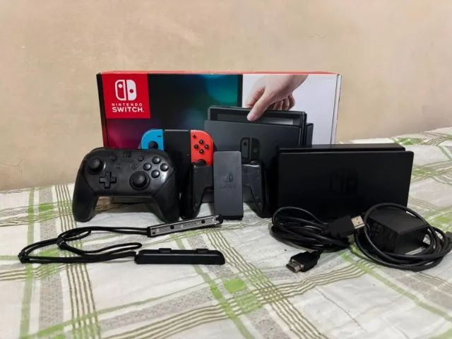 Nintendo Switch Completo na Caixa + Pro Controller + Diversos Acessórios - Foto 4