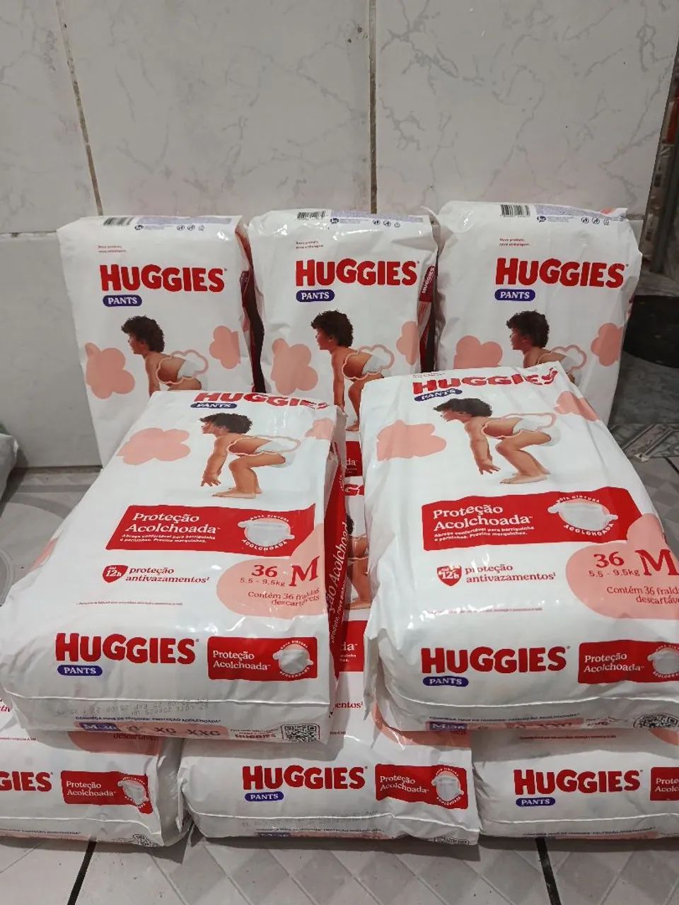Fralda Huggies M $45,00 cada
