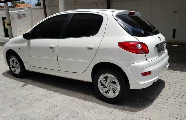 Peugeout 207 2011 HB XR 1.4 flex Novíssimo com cheiro de novo ,perfeito para uber couro - Foto 2