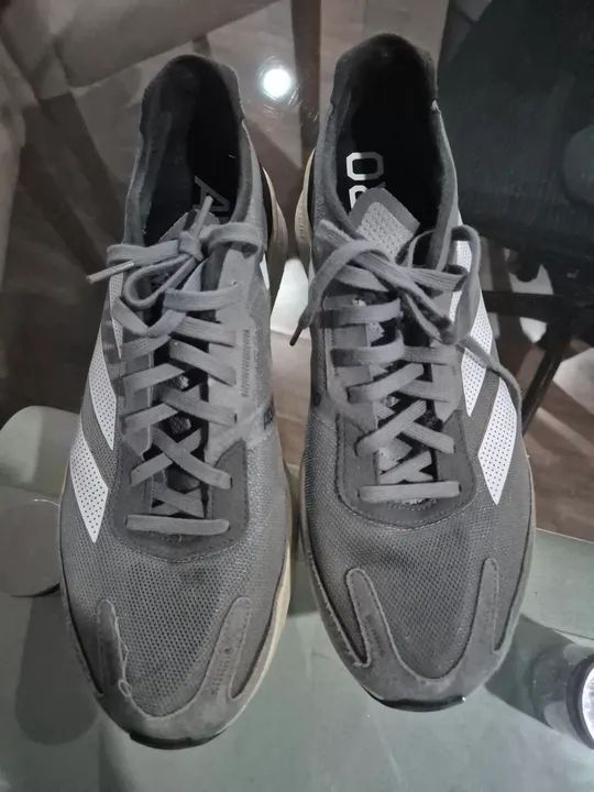 On running surfer e Adidas boston  - Foto 4