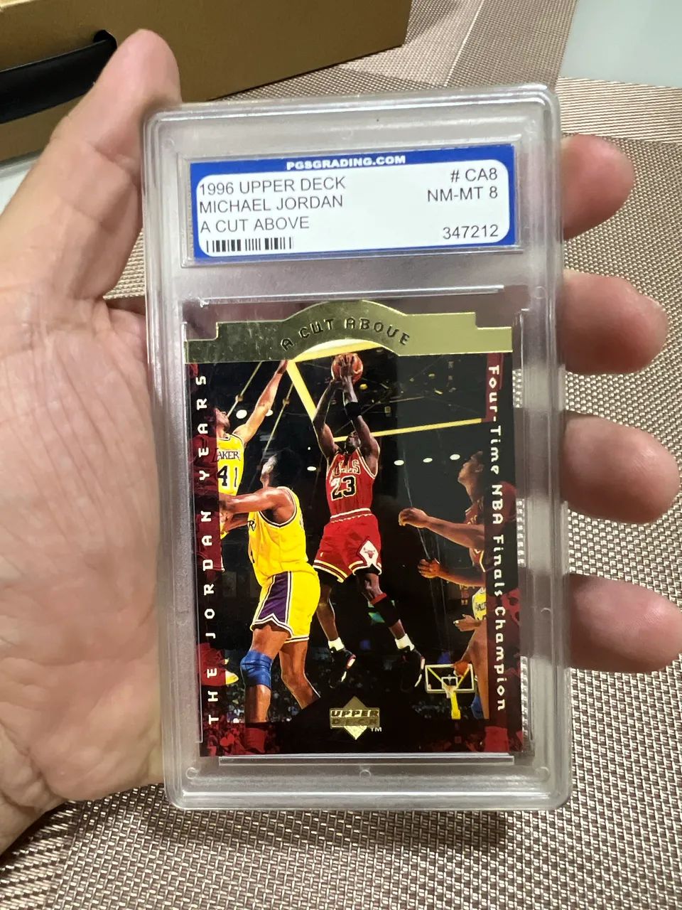1996 Upper Deck Michael Jordan A Cut Above" NM-MT 8 pela PGS Grading