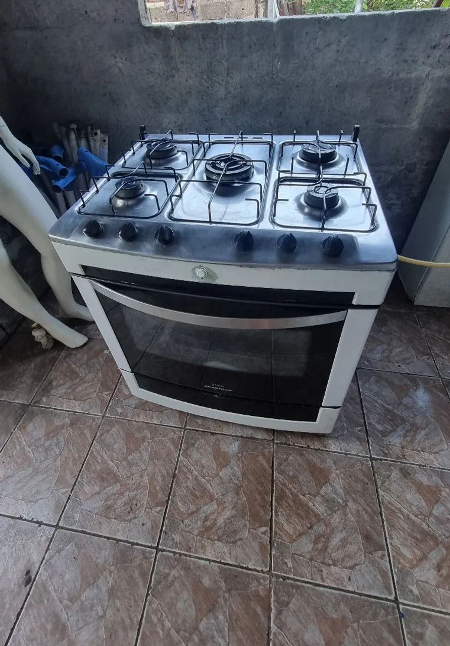 Vendo fogão de 5 bocas funcionando perfeitamente tudo 