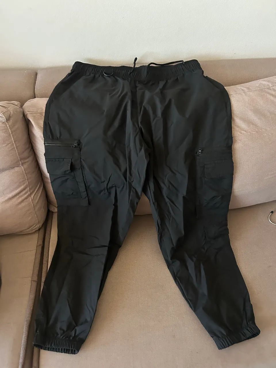 Calça de tactel 