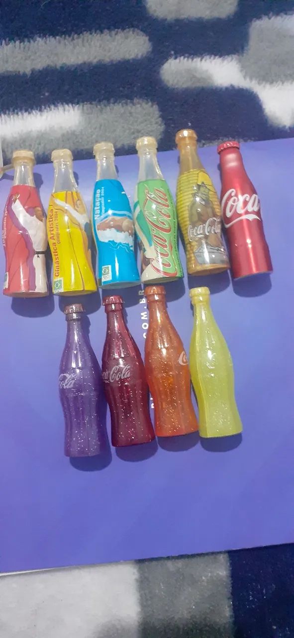 10 garrafinhas coca cola