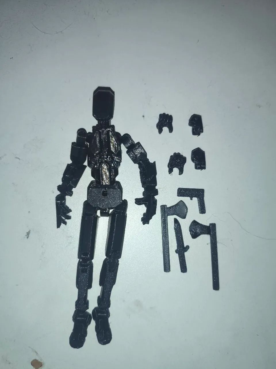 boneco preto articulado 