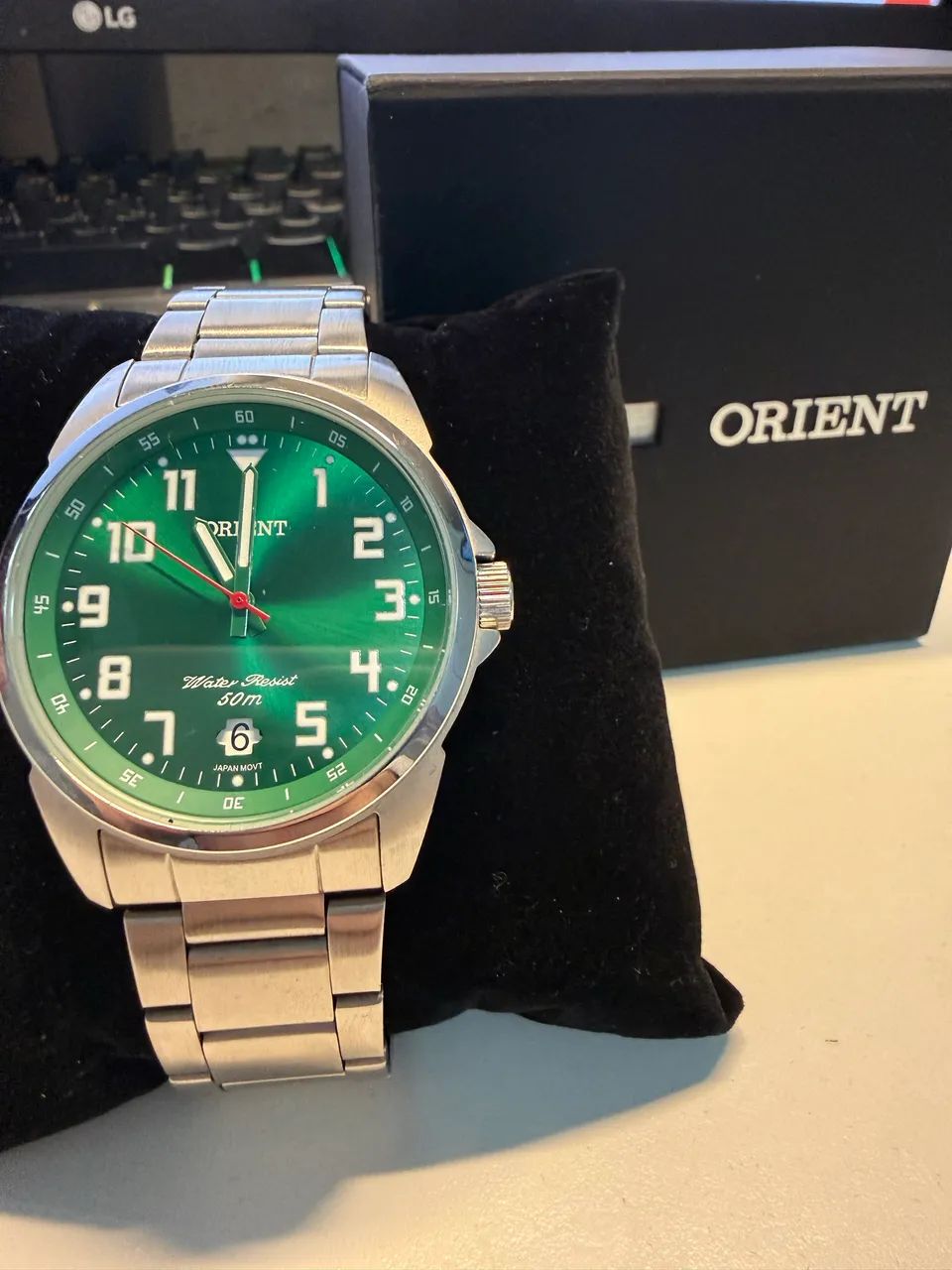 Relógio Orient verde 