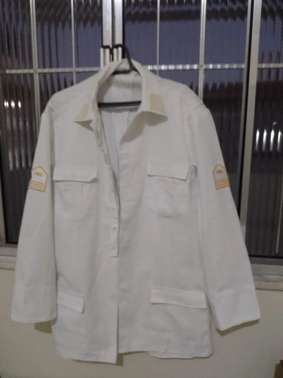 Túnica masculina do CMS