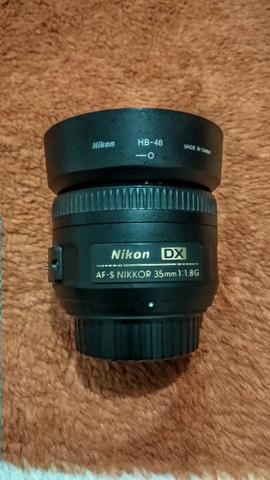 Nikon D5100 + Lente Nikkor 18-105 VR + Nikkor 35mm 1.8 + Bateria Extra - Foto 2