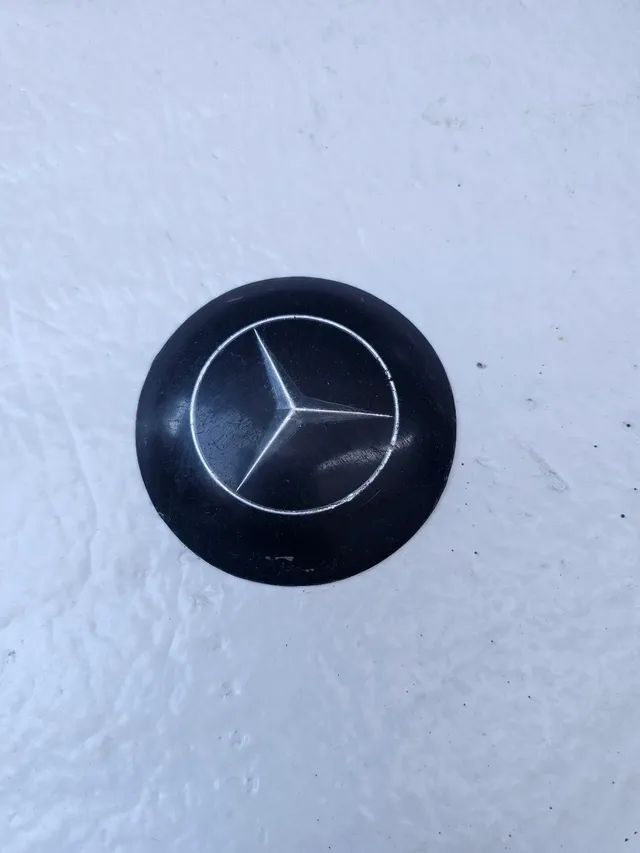 Caminhao mercedes LP 321 bicuda emblema botao aro buzina volante novo original 