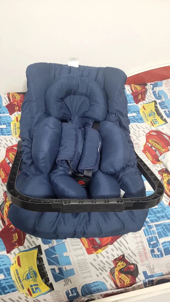 Vendo bebê conforto + capa protetor por 50,00
