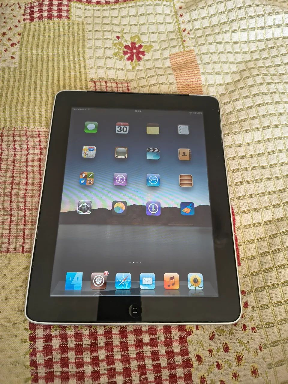 iPad de 1ª geração 64 GB em pleno funcionamento.