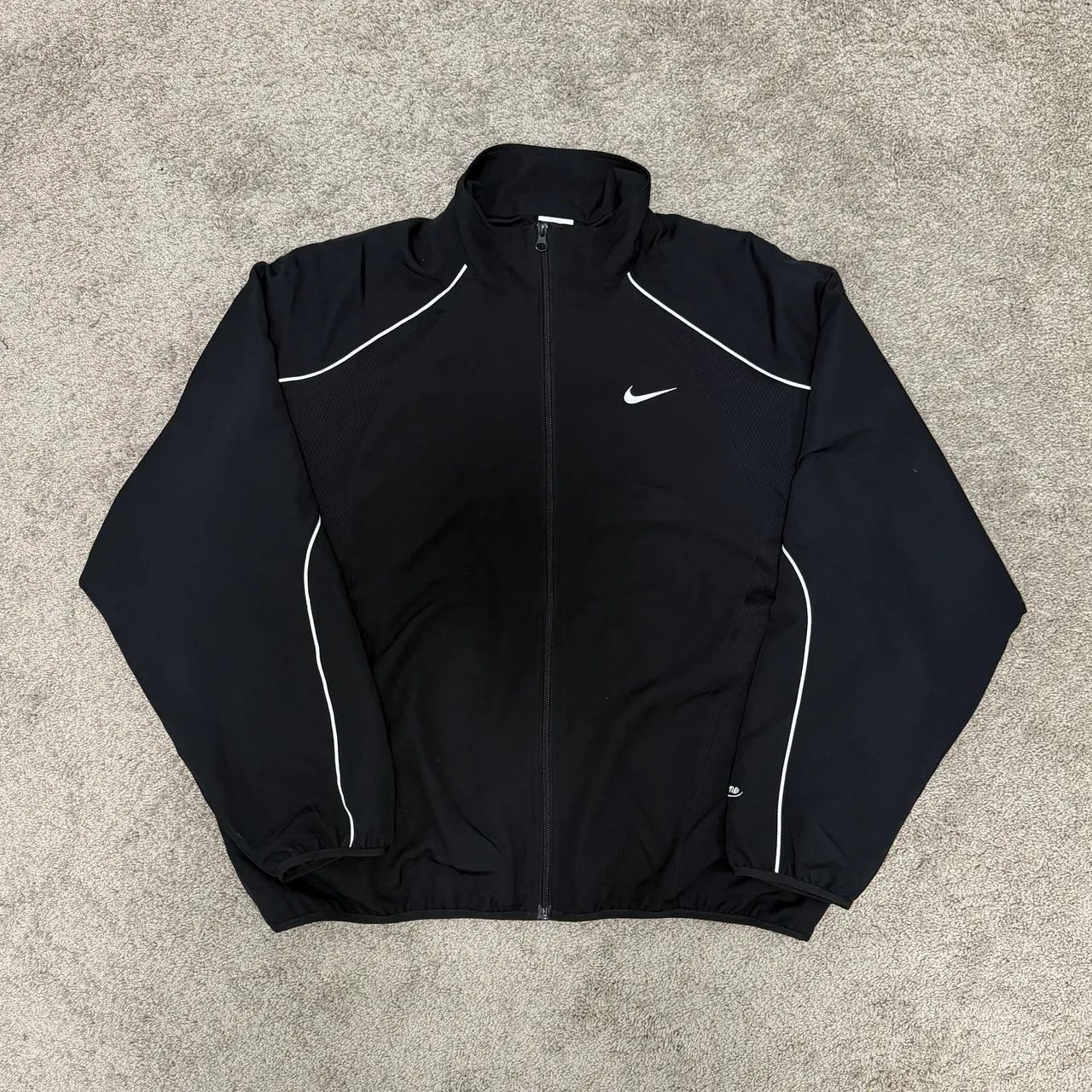 Jaqueta Nike x Supreme