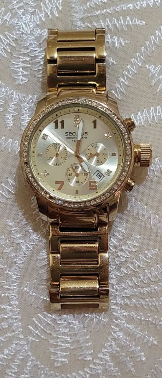 Vendo um relógio  feminino  dourado original  séculos 