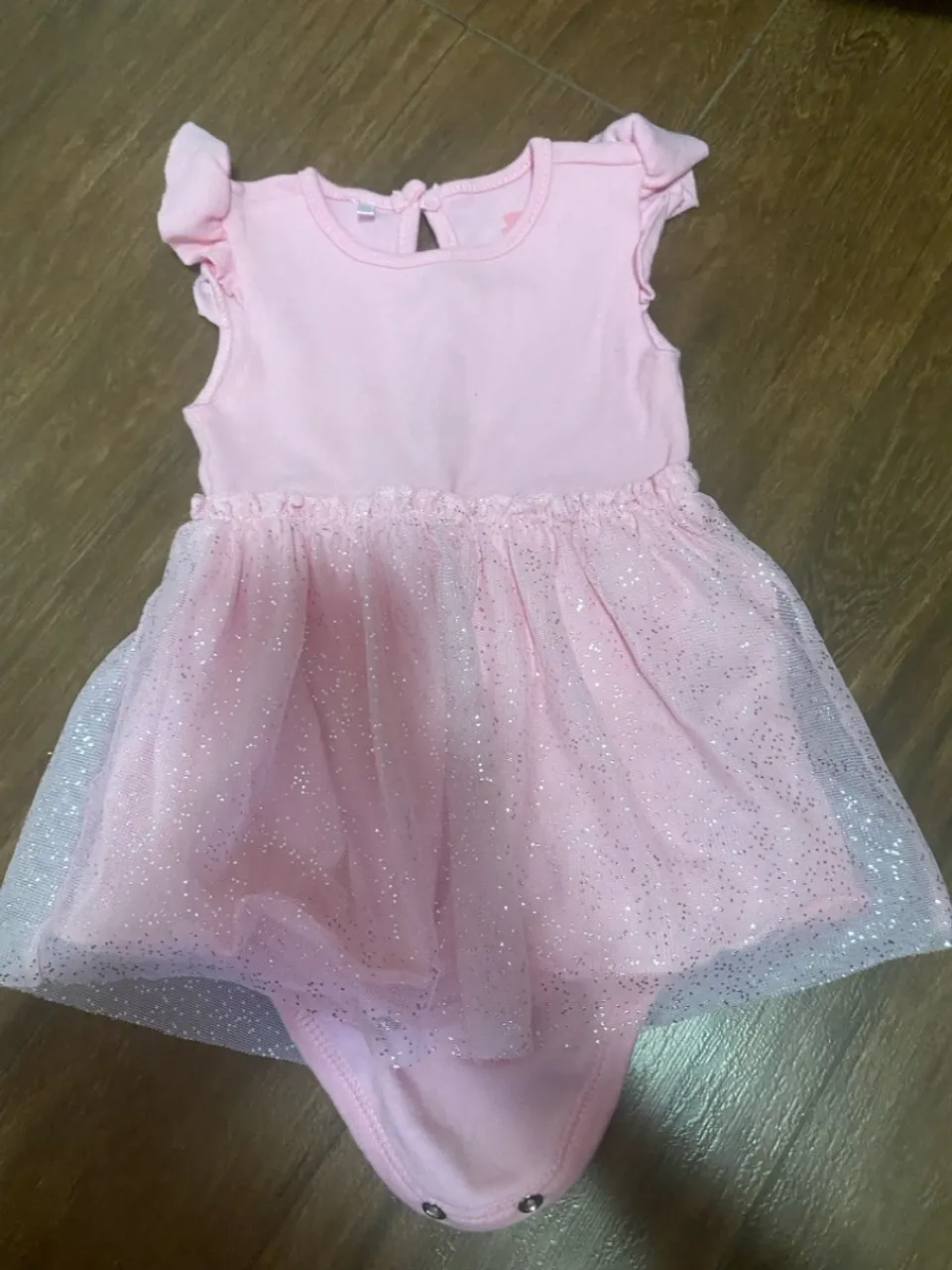 Vestido body rosa com glitter para bebê