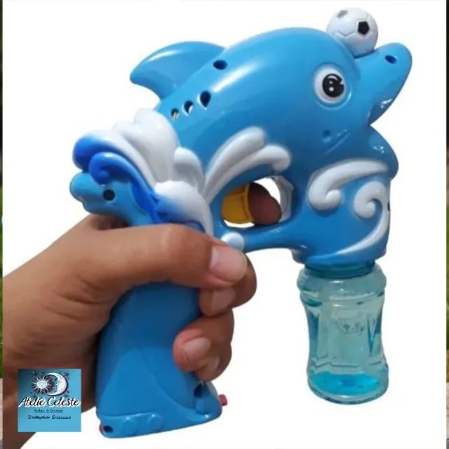 Brinquedo Lança Bolhas De Sabão C/ Led Pistola C/ Agua sabão à pilha com luz de led. - Foto 4