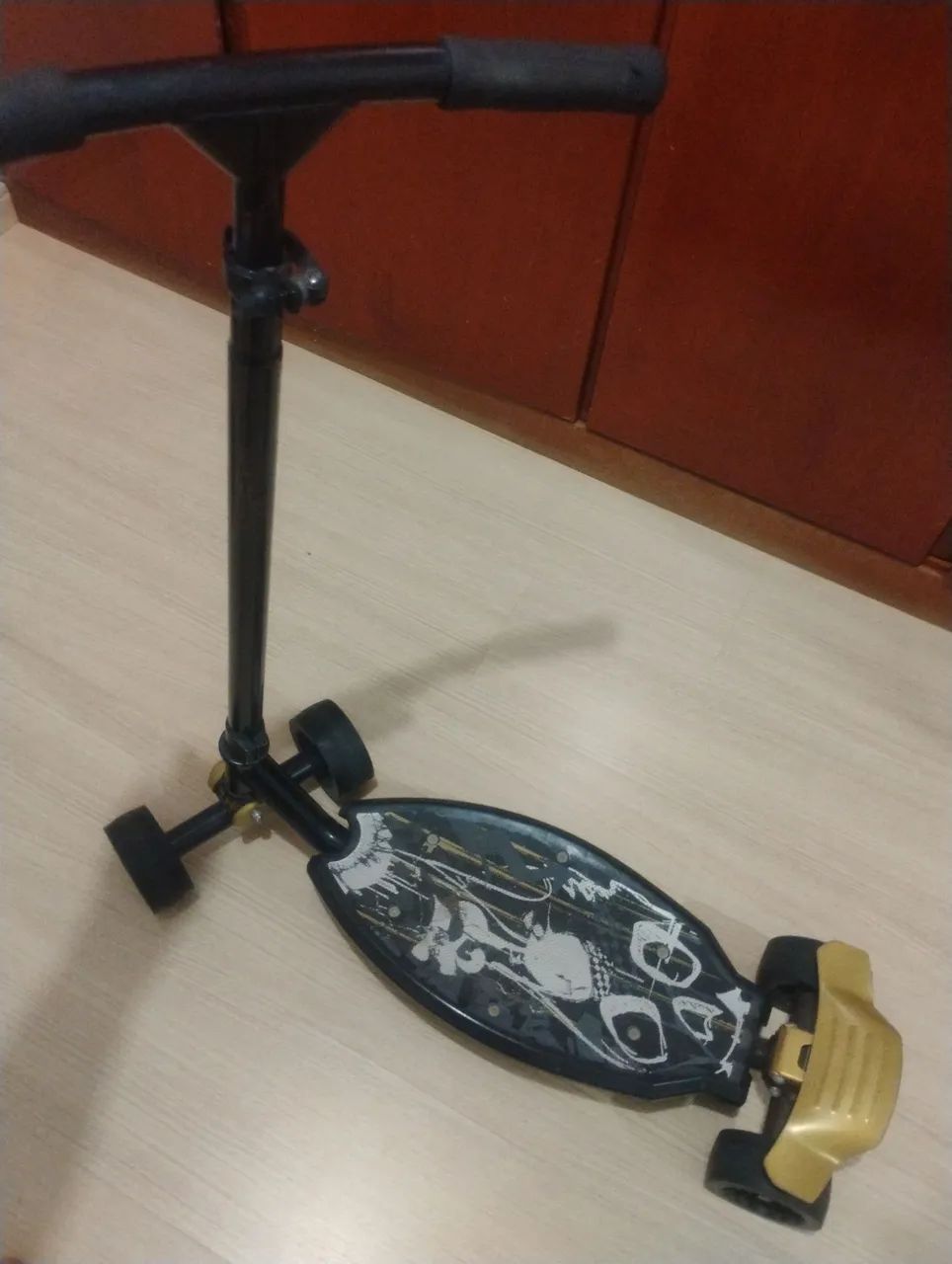 Patinete Oxelo sob 4 rodas 