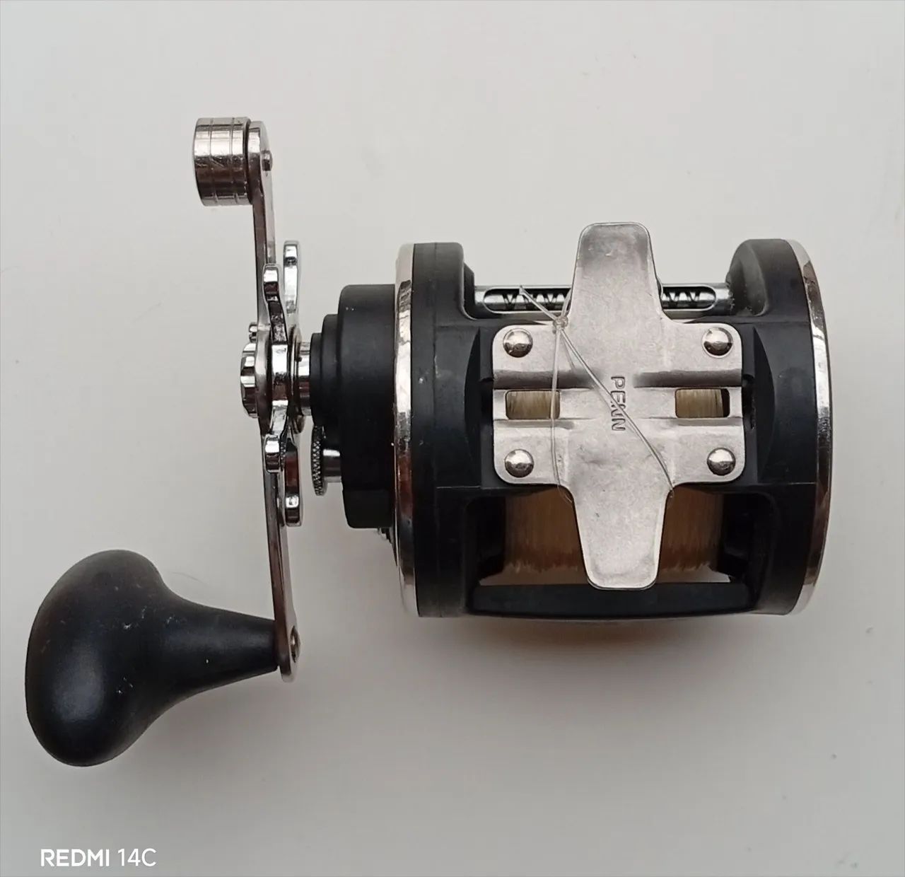 Carretilha para pesca Penn 320 GT2 - Foto 4