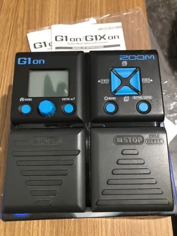 Zoom g1on na caixa manuais e cabo USB e powerbank - Instrumentos