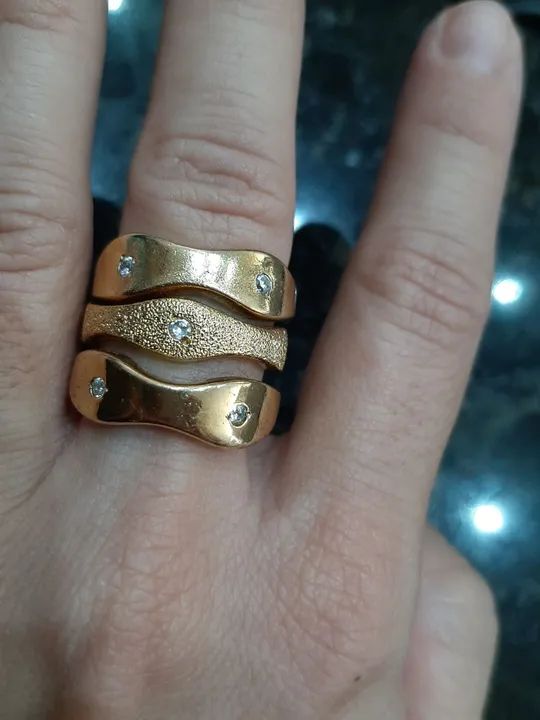 Anel triplo dourado com brilhante