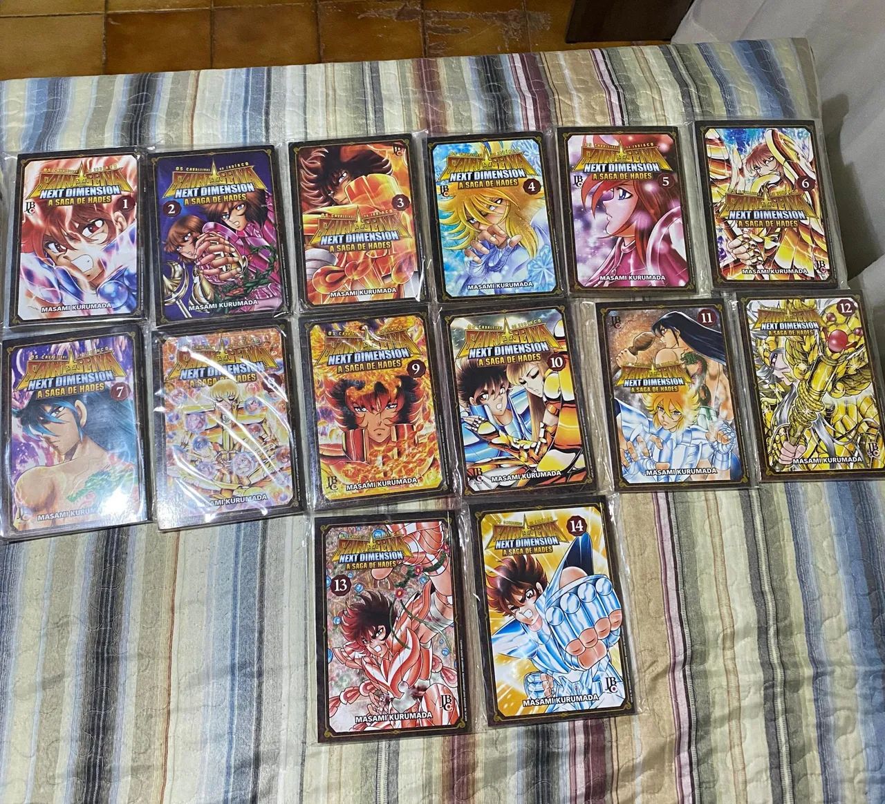 Mangá cavaleiros do zodíaco next Dimension volume 1 ao 14 - Livros