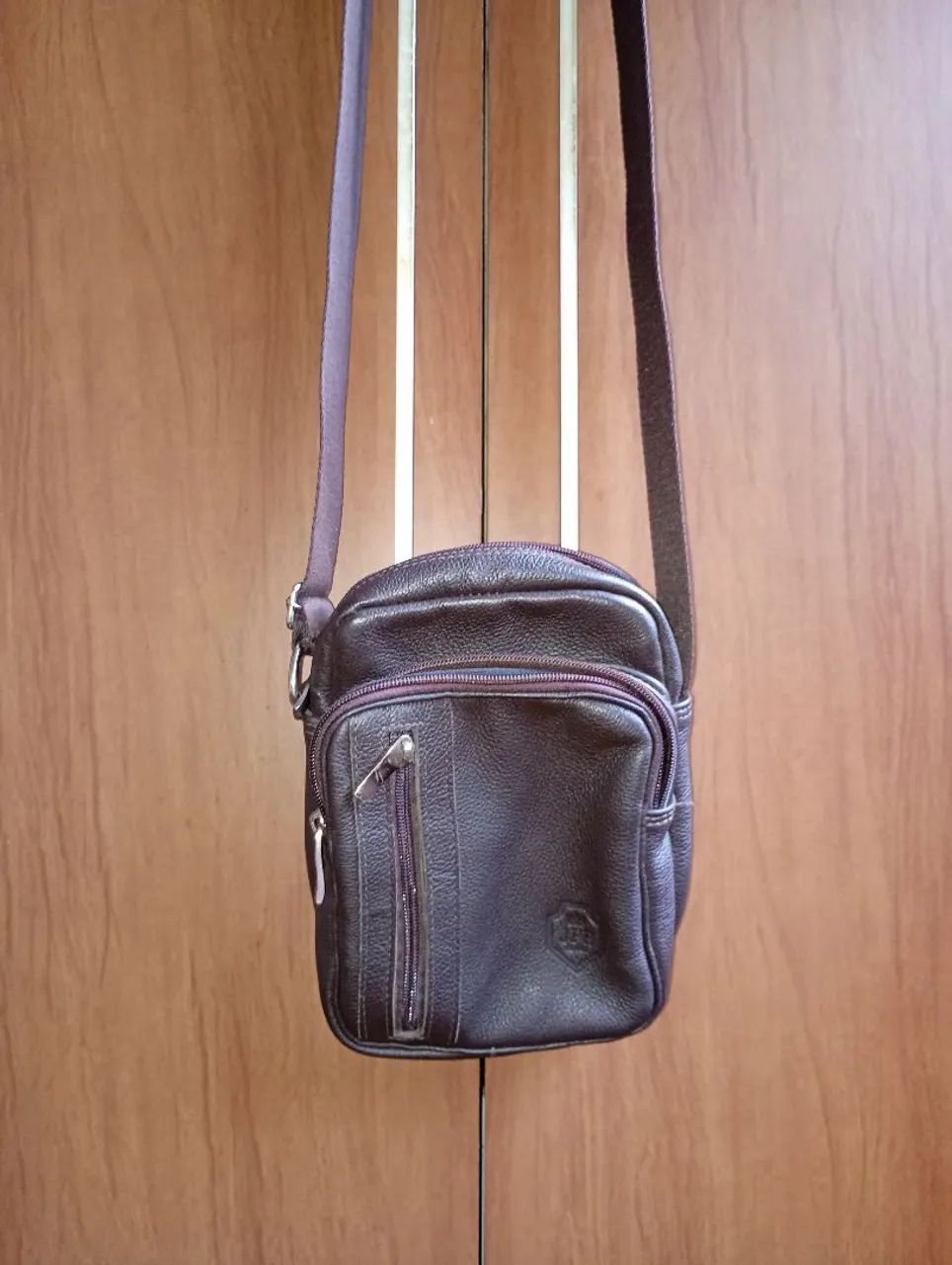 Bolsa lateral em couro legítimo 