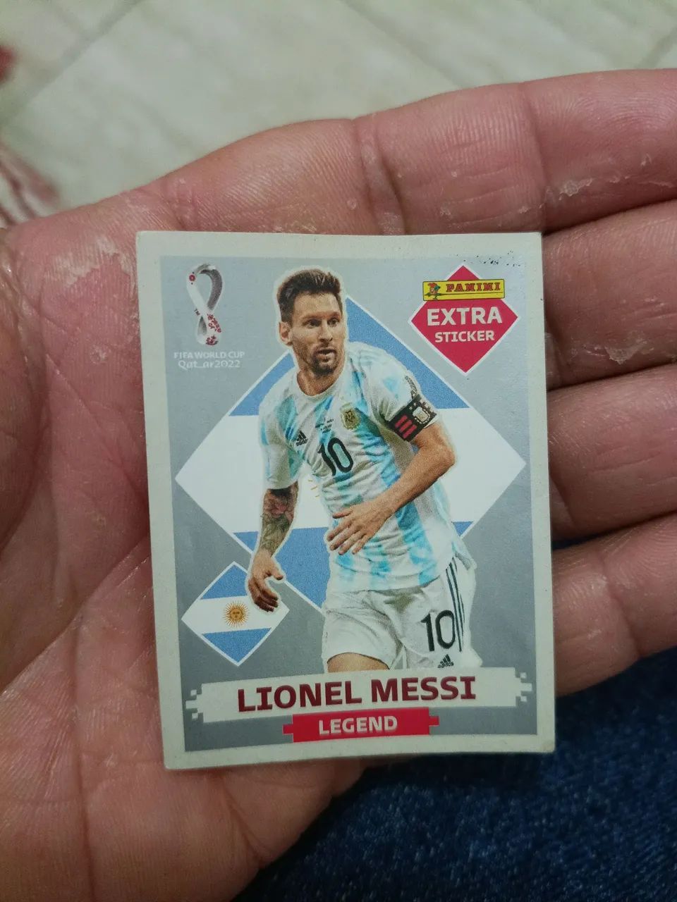 Figurinha panini extra lengeng prata Messi copa 2022