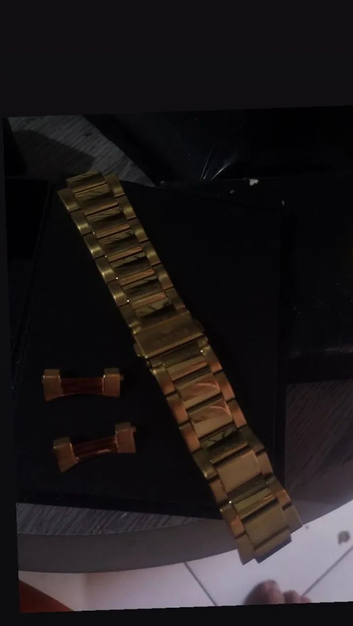 Puceira cor de ouro de relógio já com os terminais original 