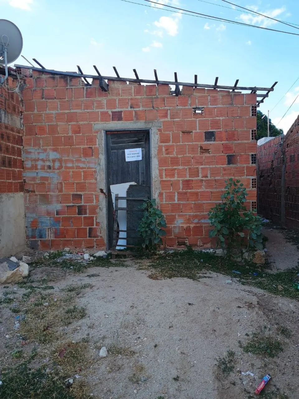 Terreno com casa