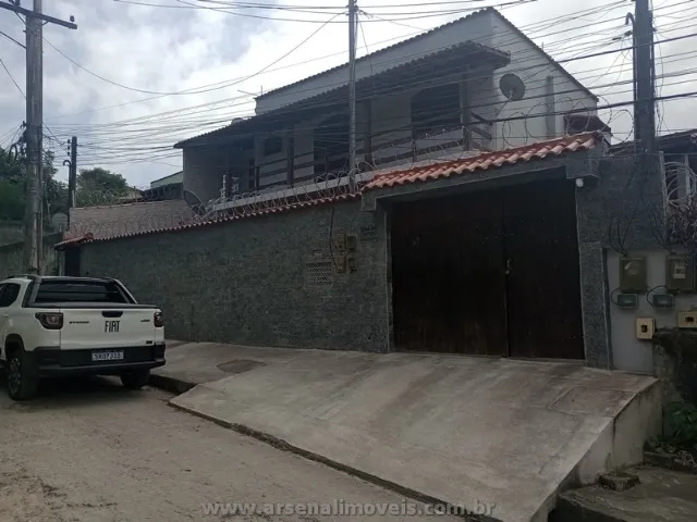 .Arsenal Imóveis vende-Casa com quintal em Rio do Ouro.
