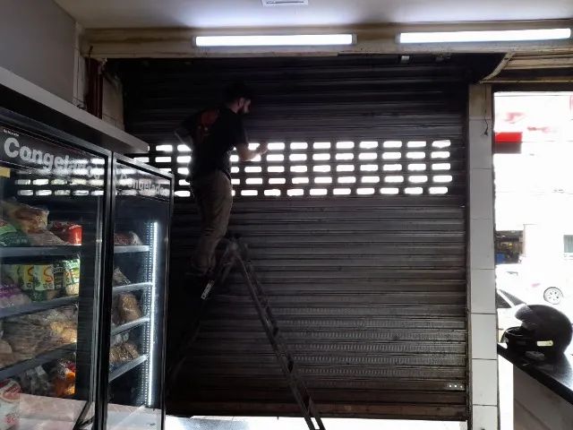 manutenção em porta de aço manual e automatica - Foto 3