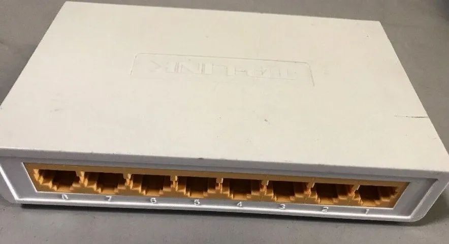 Switch 8 portas gigabit 10/ 100 mbps-tp link tl-sf1008d