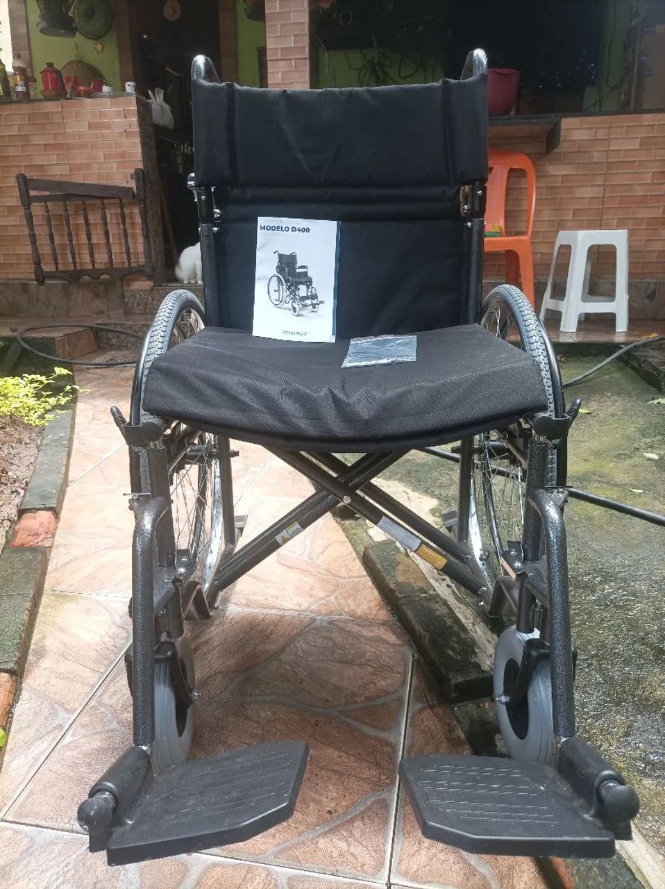 Cadeira de rodas, nova
