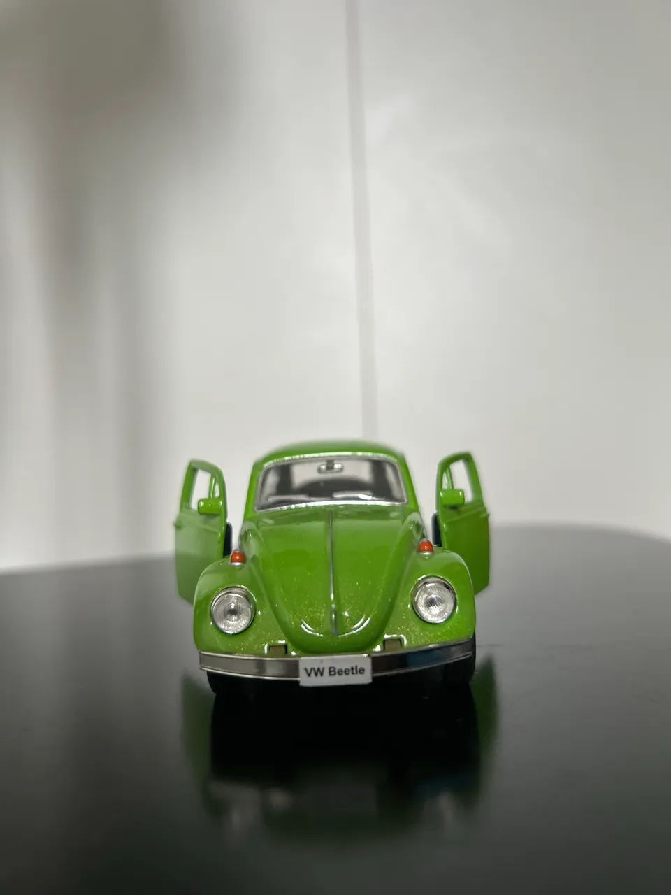 Volkswagen Beetle verde metálico
