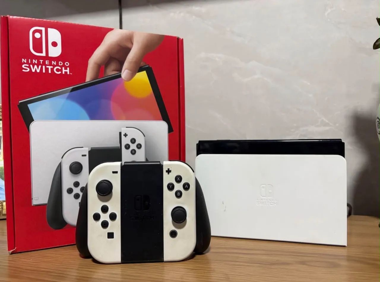 Nintendo Switch Oled na caixa + jogos Vendo e troco  - Foto 2