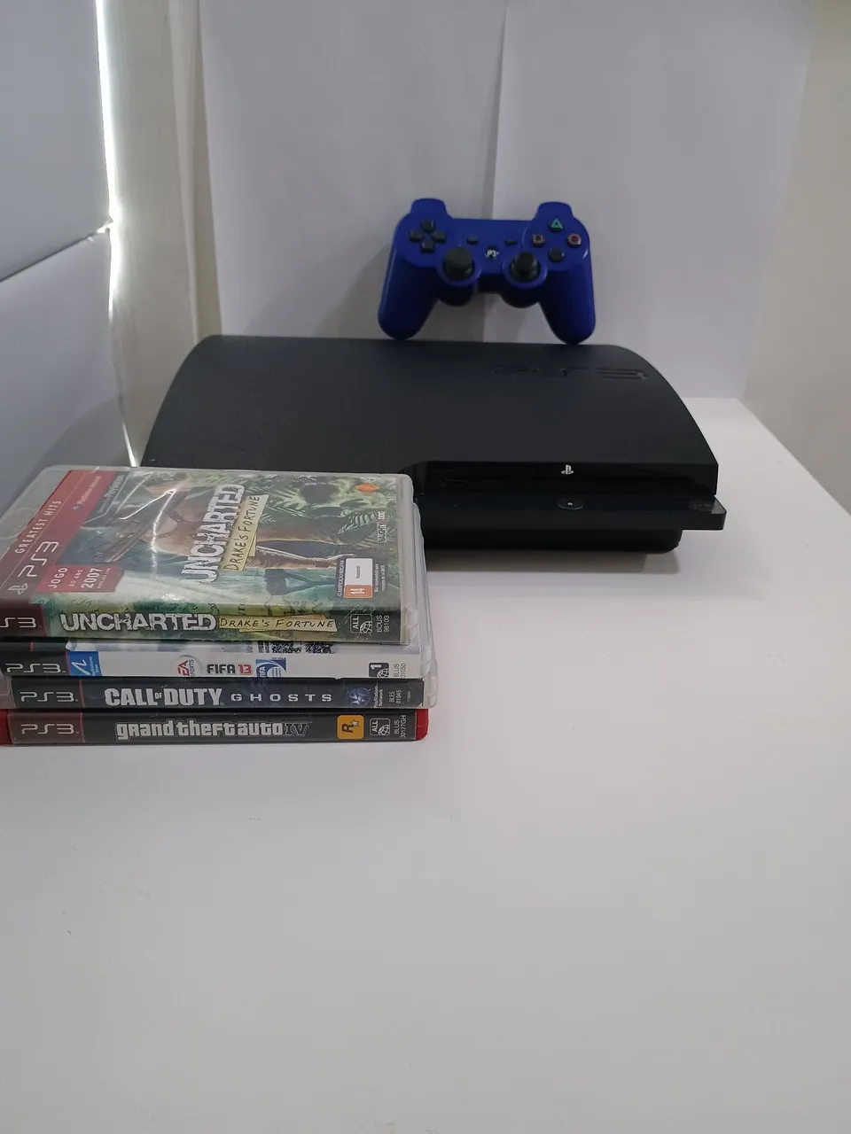 Playstation 3 + jogos