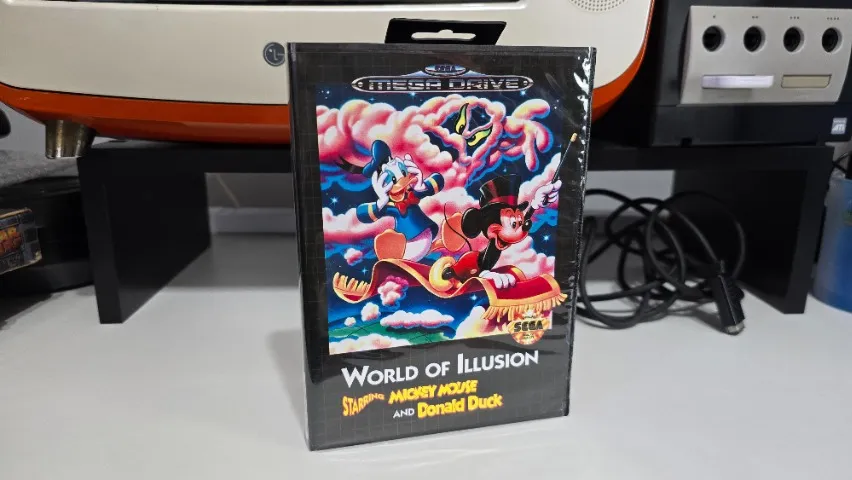 Jogo World of Illusion starring Mickey e Donald Mega Drive/Genesis paralelo na caixa