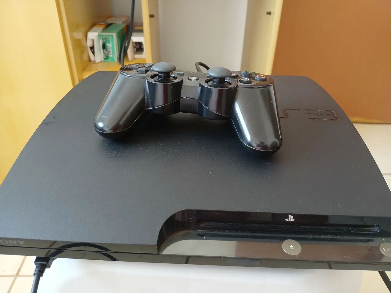 PS3 Slim + Vários jogos. Não vendo separado.