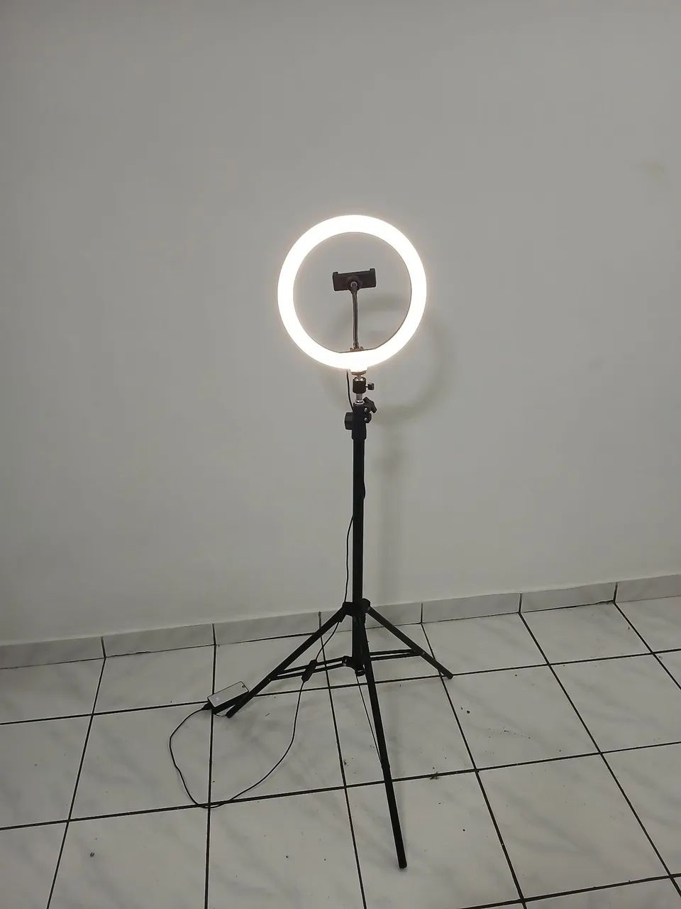 Vendo tripe de video e luz