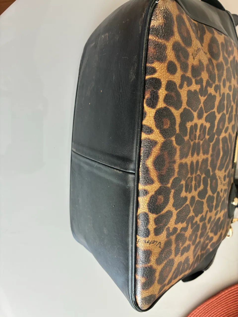 Bolsa couro de leopardo Victor Hugo
