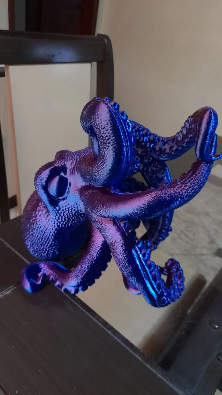 Escultura Porta-Garrafas Polvo Metalizado<br><br>Decoração Exclusiva - Foto 4