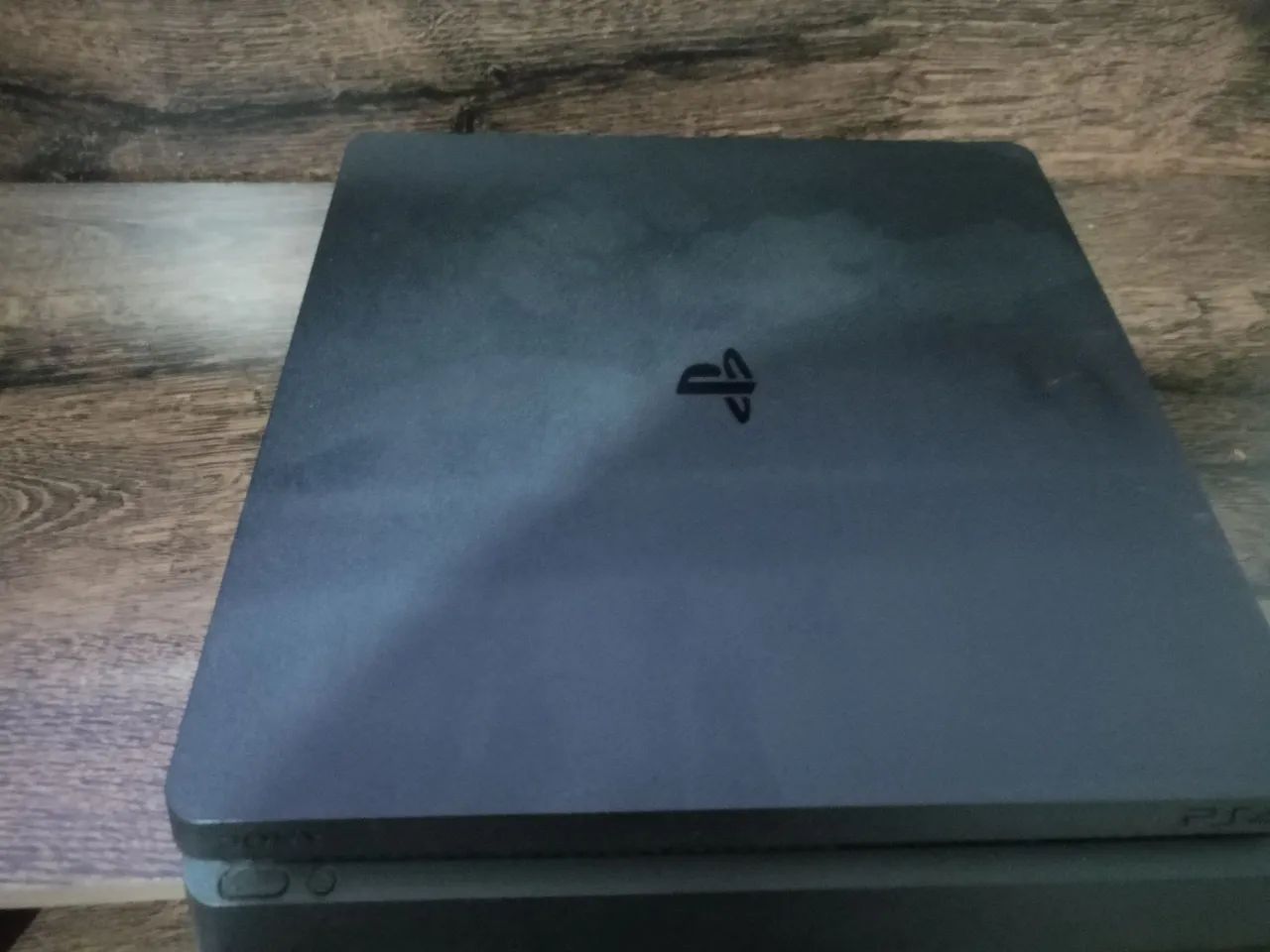 Ps4 slim 1tb com 2 controles originais 4 jogos ótimo estado nunca aberto  - Foto 2