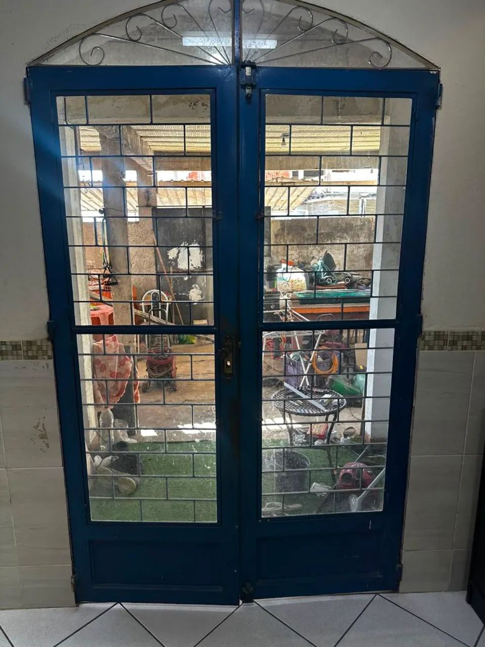 Porta de ferro com vidro articulado  - Foto 2